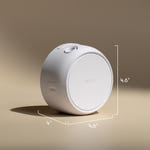 White cylindrical device with 'pura' branding and dimensions on a beige background