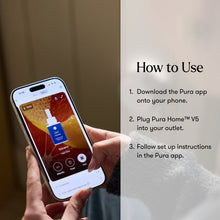 Hand holding a smartphone with Pura app interface, showing how to use the device.