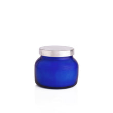 Coconut Santal Petite Candle, back lit closed