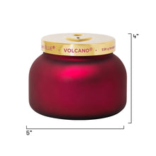Red candle with a gold lid labeled 'Volcano' and dimensions on a white background