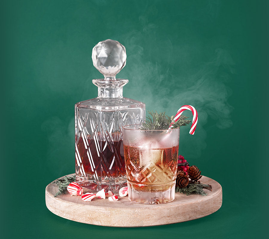 Smoky glass of whiskey and peppermint candy