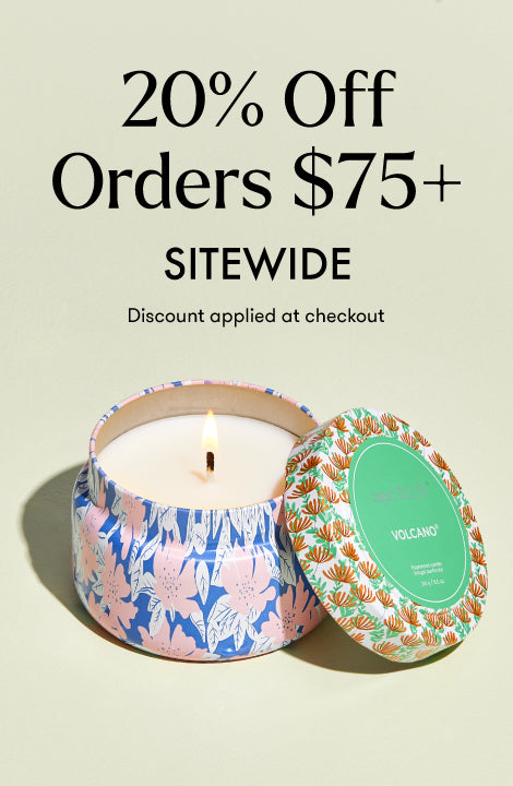 Candle in a decorative tin with a discount promotion on a beige background