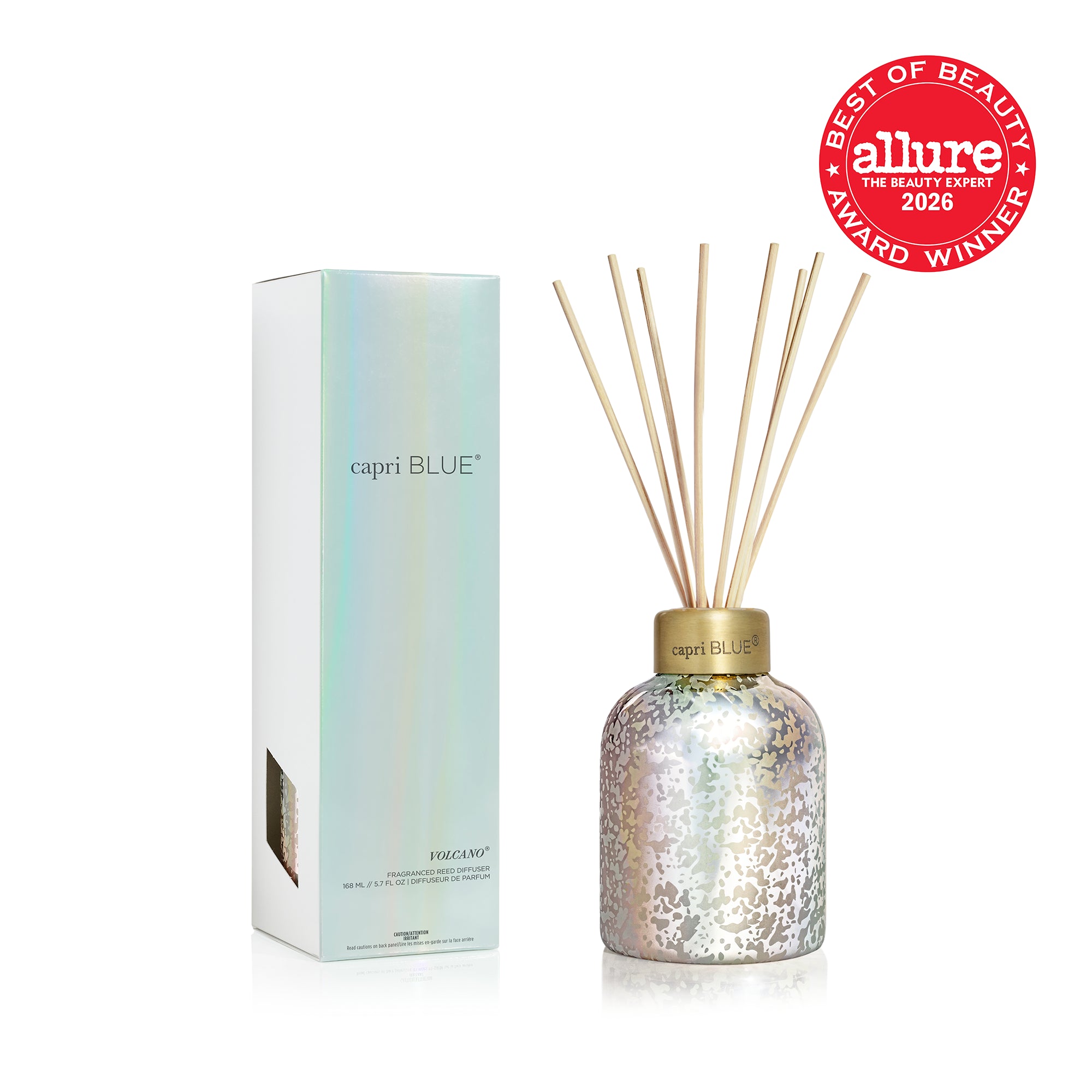 A Iridescent silver-patterned diffuser bottle with natural wood reeds, shown next to its packaging box and the Allure 2026 Best of Beauty Award Winner seal.