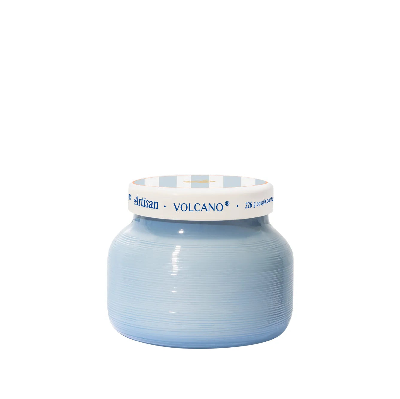 A light blue ribbed ceramic jar with a white lid featuring blue text that reads 'Artisan VOLCANO'.