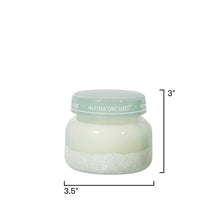Small jar with a light green lid labeled 'Aloha Orchid' on a white background