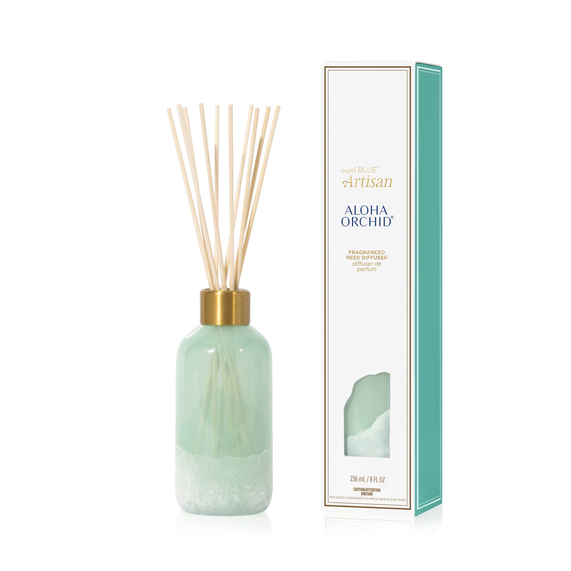 Mint green diffuser bottle with wooden sticks and matching box on a white background
