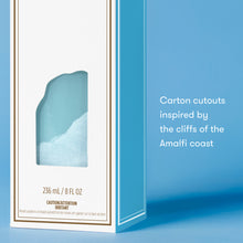 Product packaging with a design inspired by the Amalfi coast on a blue background