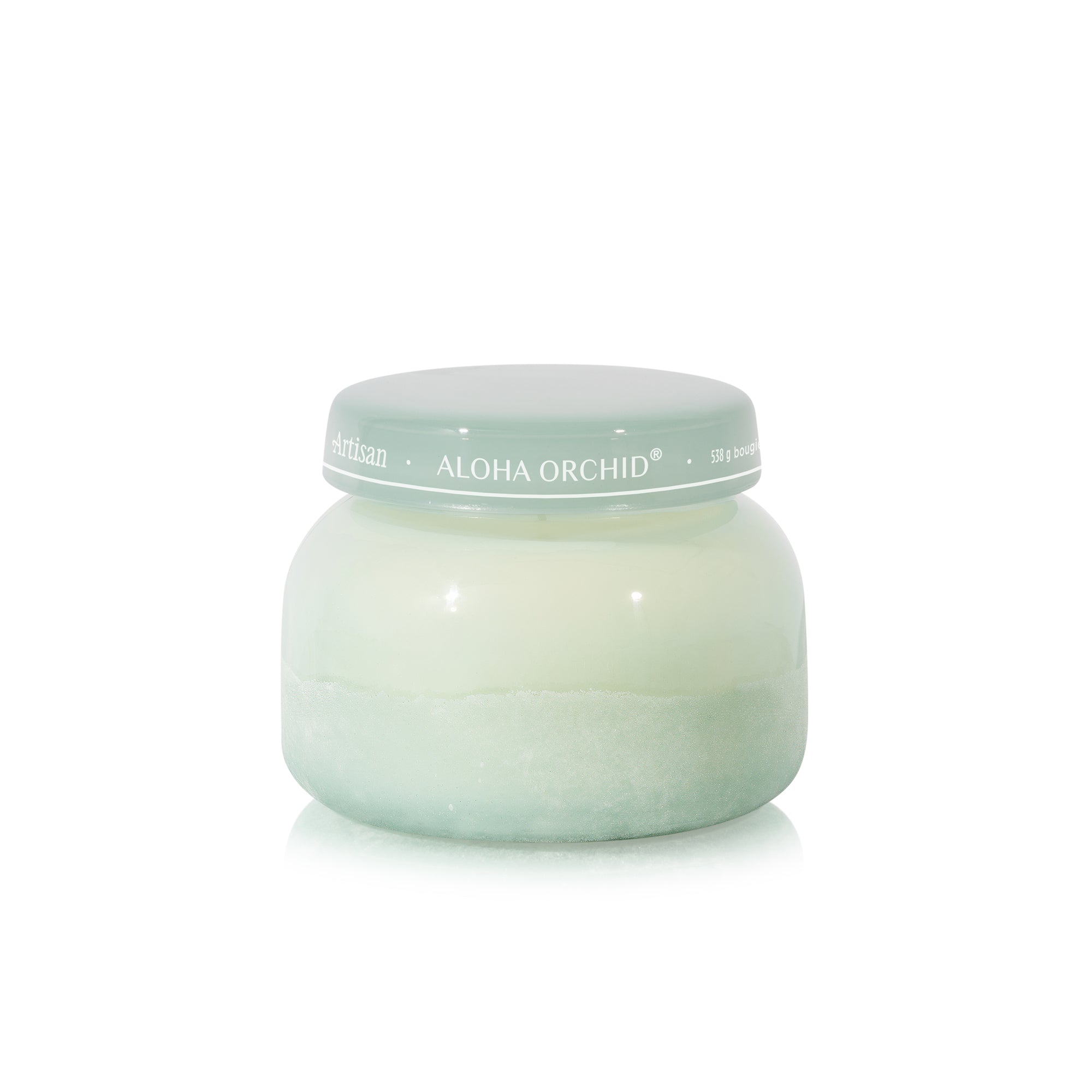 Jar of cream with a light green lid on a white background