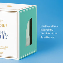 Artisan candle packaging with text on a blue background
