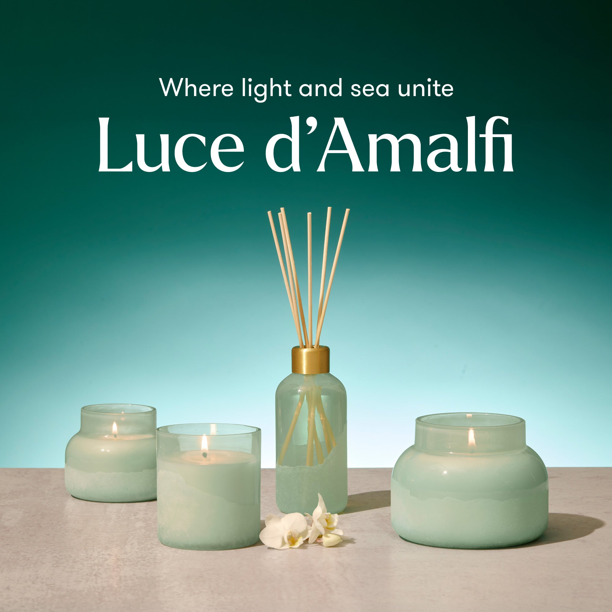Luce d'Amalfi candles and diffuser with a teal background