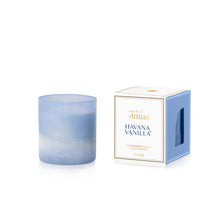 Blue candle with a matching box labeled 'Havana Vanilla' on a white background