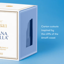 Fragrance box with 'Artisan' branding on a blue background
