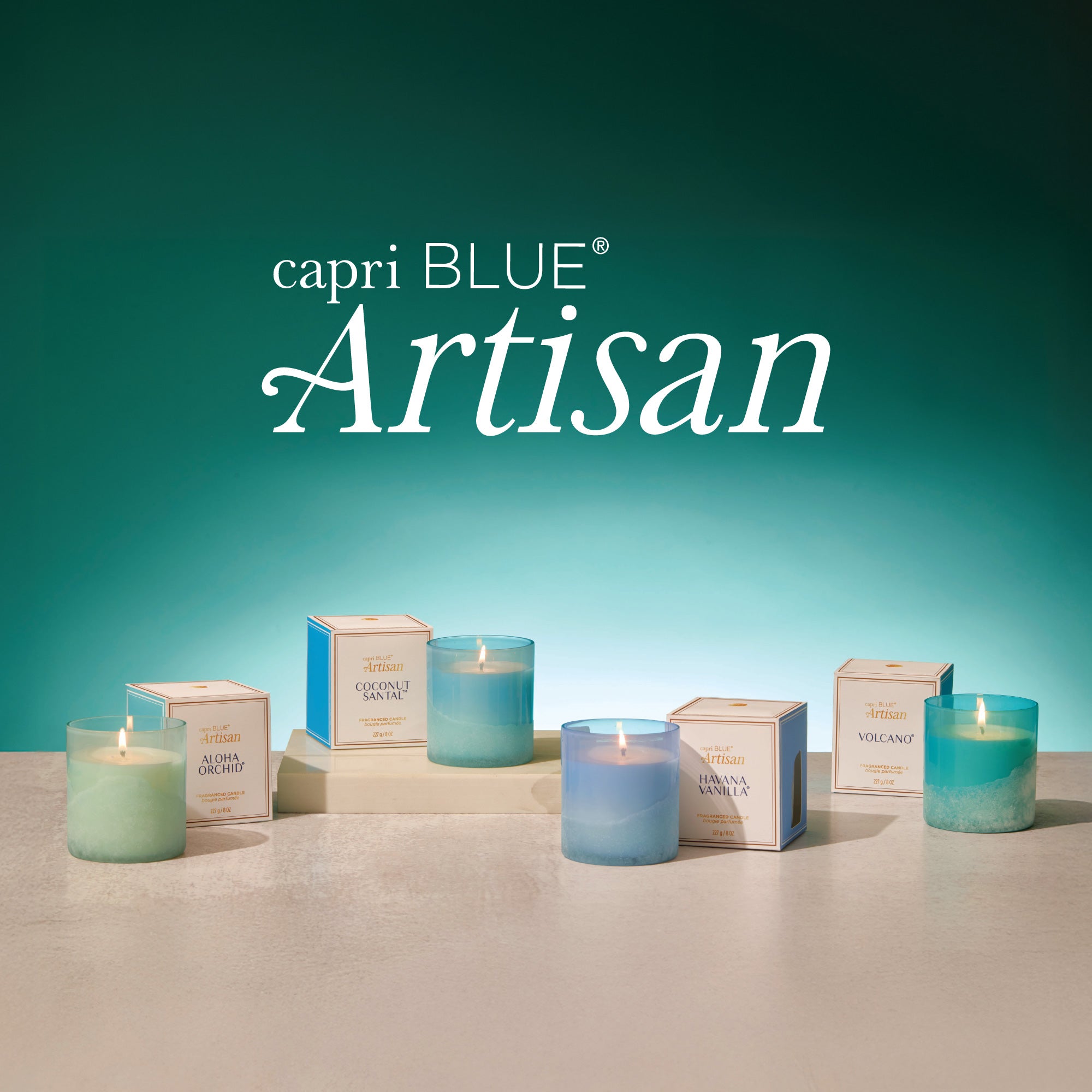 capri BLUE Artisan candles and boxes on a teal background