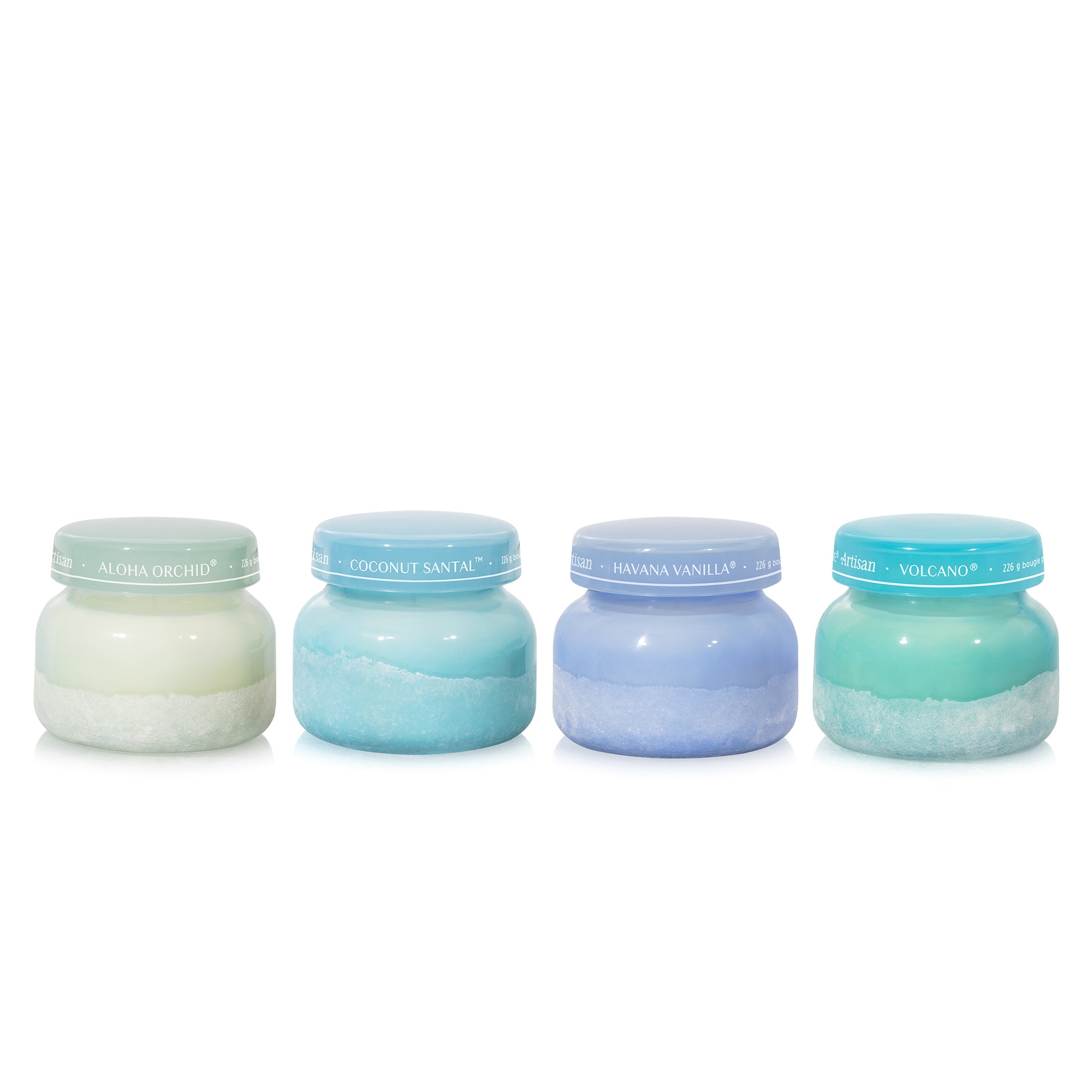 Four small jars with blue lids on a white background