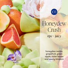 Fruit and floral arrangement with 'Honeydew Crush' text and brand logo.
