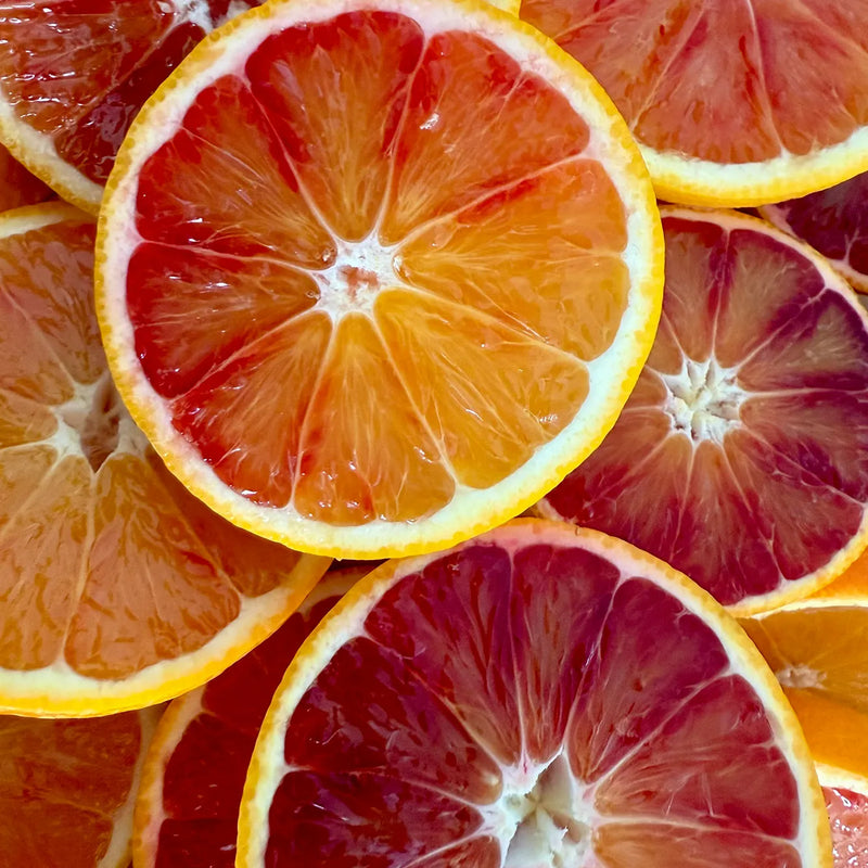 Various citrus slices stacked on each other.