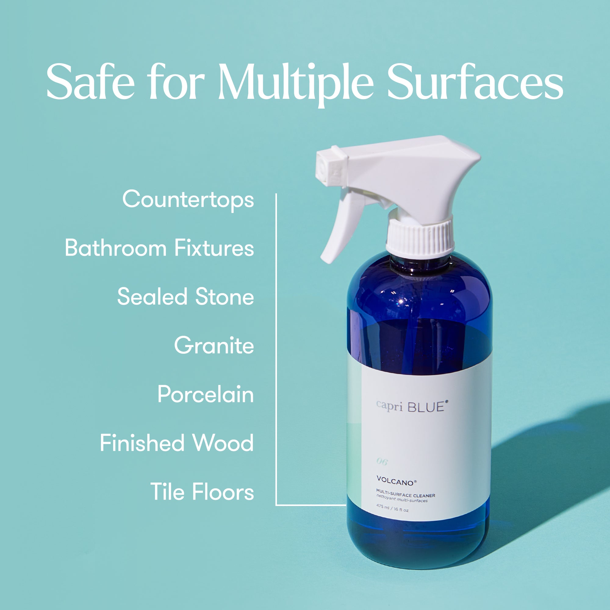 Blue spray bottle labeled 'VOLCANO' with text about surface safety on a light blue background