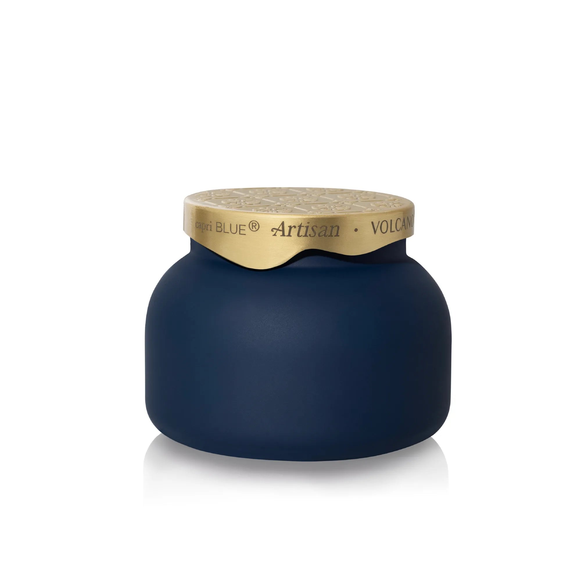 A dark navy blue jar with a textured gold lid, featuring the brand name 'In Blue' and product line 'Artisan Volcano' printed on the gold band.
