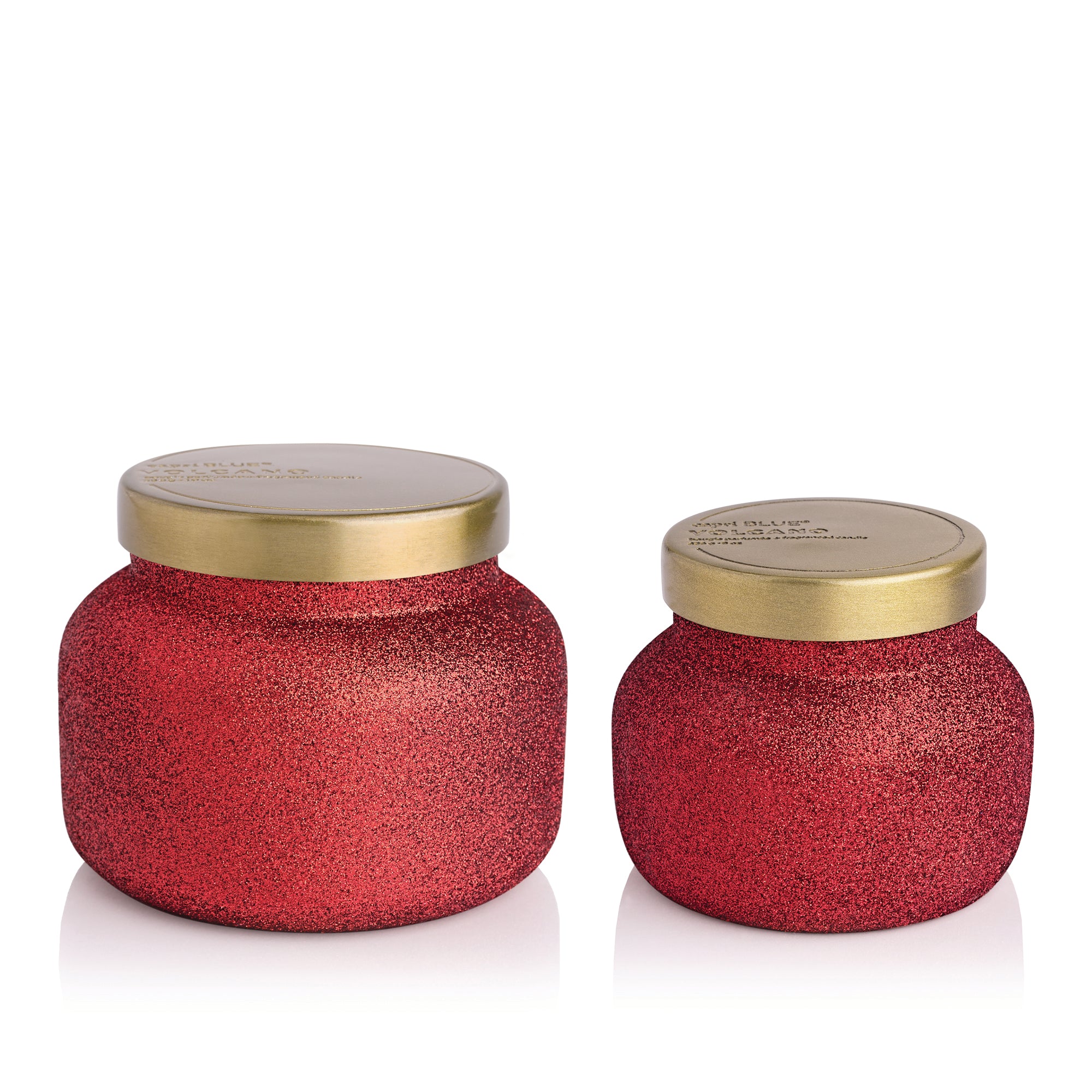 Two Volcano Glam Candles on a white background.