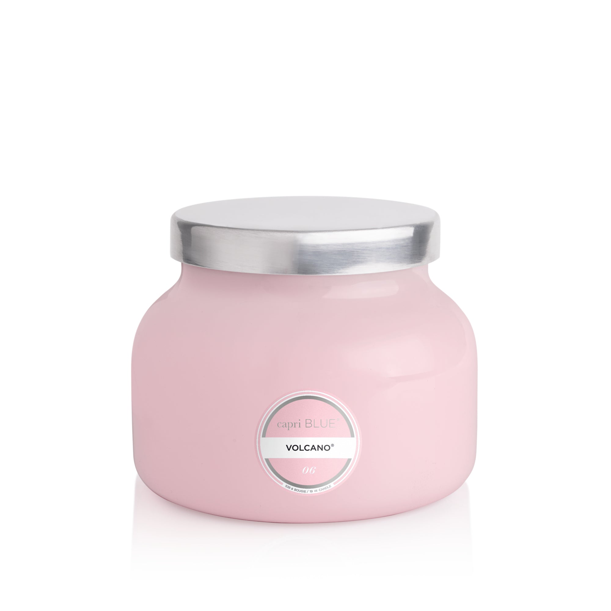 Pink candle jar with silver lid on a white background